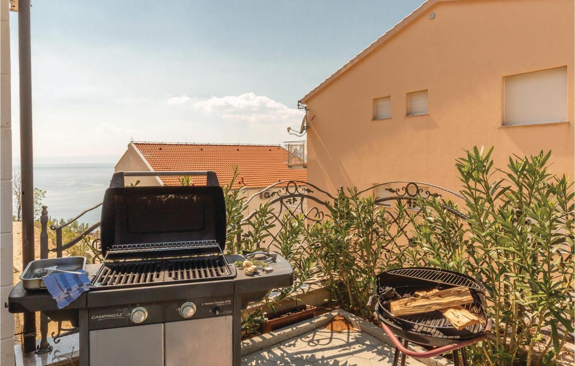 Nice Apartment In Krvavica With House Sea View Екстер'єр фото